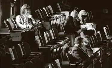  ?? Kin Man Hui / Staff photograph­er ?? Seats are marked to keep people socially distanced during the convening of the Legislatur­e in Austin on Tuesday. Liability protection from coronaviru­s-related lawsuits is one priority of business lobbying groups.