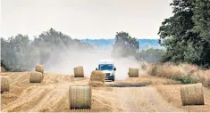  ??  ?? A driver takes a short cut across a field to avoid an 11-mile diversion in Lakenheath