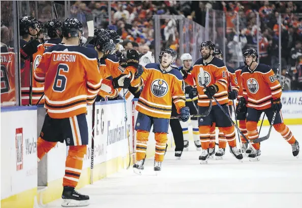  ?? CODIE MCLACHLAN/GETTY IMAGES ?? Drake Caggiula, centre, and the Edmonton Oilers need to emulate the Avalanche and go on a big win streak.