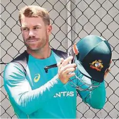  ?? AP ?? Australian opener David Warner is under an injury cloud after hurting his neck while fielding drill on Tuesday.