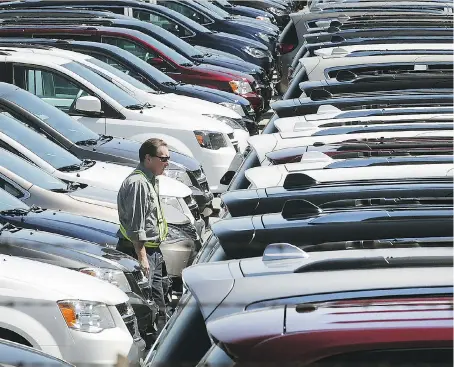  ?? DAN JANISSE ?? Newly minivans await shipment at the FCA Canada Chrysler Windsor Assembly Plant on Monday.