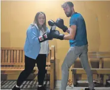  ?? ?? Sparring to go: Hollie Smith and Jack Anderson getting ready for a 24-hour charity boxathon in Oban.