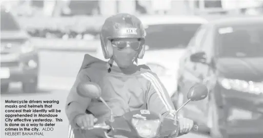  ?? ALDO NELBERT BANAYNAL ?? Motorcycle drivers wearing masks and helmets that conceal their identity will be apprehende­d in Mandaue City effective yesterday. This is done as a way to deter crimes in the city.