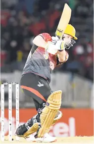  ?? CPL T20 VIA GETTY IMAGES ?? Colin Munro of Guyana Amazon Warriors on the go during Match 9 of the 2017 Hero Caribbean Premier League between Guyana Amazon Warriors and Trinbago Knight Riders at Queen’s Park Oval on Friday night.