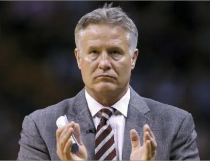  ?? AP FILE ?? As the interim general manager, Philadelph­ia 76ers coach Brett Brown has the opportunit­y to add the kind of players who fit his system, which produced 52 wins and a trip to the Eastern Conference semifinals in 2017-18.