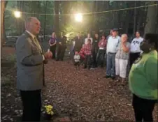  ?? PHOTOS BY KEVIN TUSTIN — DIGITAL FIRST MEDIA ?? State Rep. Stephen Barrar, R-160, of Upper Chichester, speaks to family members at Sunday evening’s vigil.