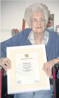  ??  ?? ●●Betty Yorke with her degree certificat­e