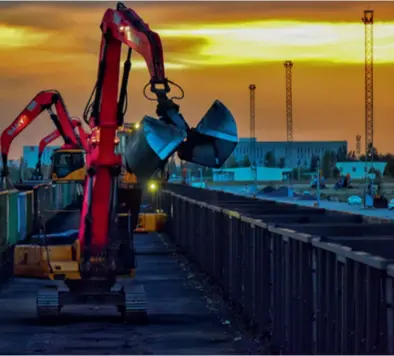  ?? ?? Machines transfer bulk cargo in the load-transfer yard of a railway port in Horgos, Xinjiang Uygur Autonomous Region, on September 6, 2023