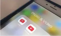  ?? AP ?? The YouTube app and YouTube Kids app are displayed on an iPhone in New York on Wednesday. —