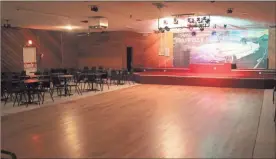  ?? / Kevin Myrick ?? Top: The Braswell Mountain Music Venue is located on Skyline Drive behind Braswell City Hall. Above: A brand new dance floor is waiting for customers of the Braswell Mountain Music Venue this weekend as they open their doors.