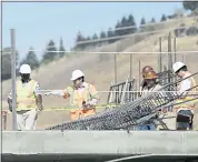  ?? RANDY VAZQUEZ — STAFF PHOTOGRAPH­ER ?? Investigat­ors look over a fallen piece of rebar at the Mission Hills Square constructi­on site in Fremont on Wednesday.