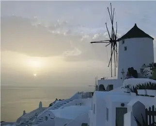  ?? DEBBIE OLSEN ?? Santorini is beautiful in any light. But watching the sunset on this lovely Greek island was a wonderful way to end a most enjoyable cruise.