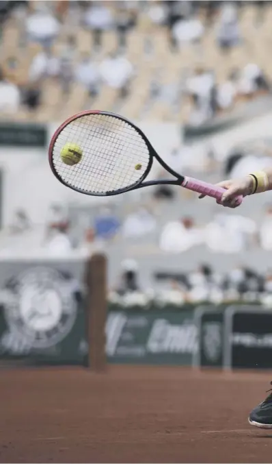  ??  ?? 0 Russia’s Anastasia Pavlyuchen­kova stretches to return the ball during her gruelling French Open