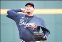  ??  ?? In this March 3, 2020 file photo, Atlanta Braves starting pitcher Felix Hernandez warms up for a spring training baseball game against the Tampa
Bay Rays in Venice, Florida. (AP)