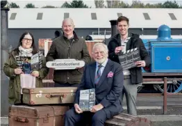  ?? VISITSCOTL­AND/JULIE HOWDEN ?? Launching the film location guide at Bo’ness Station are (left to right): Amanda Kilburn, Bo’ness & Kinneil Railway business manager; Neil Christison, VisitScotl­and regional director; Coun Paul Garner, from Falkirk Council; and (front) actor James Cosmo. Much-travelled Caledonian Railway 0-4-4T No. 419 gets in on the act behind.