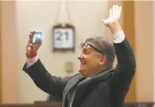  ??  ?? Hertzberg, SB10 lead author, smiles and snaps a selfie as the state Senate posts final votes after passing the bail reform bill.