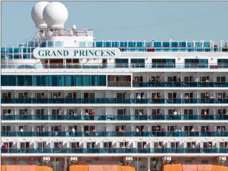  ??  ?? As the Grand Princess idled offshore, passengers were quarantine­d in their rooms.