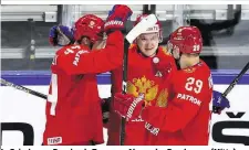  ??  ?? In Feierlaune: Russlands Team um Alexander Barabanow (Mitte)