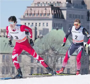  ?? JACQUES BOISSINOT / THE CANADIAN PRESS ?? Canada’s Alex Harvey, left, and Niklas Dyrhaug of Norway race in the men’s World Cup 15km freestyle pursuit Sunday in Quebec City. Harvey won the silver just ahead of Dyrhaug. Johannes Hoesflot Klaebo of Norway won the gold.