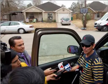  ?? Ton Chronicle via AP
Jason Fochtman/Hous- ?? In this 2018 file photo, Ernesto Valladares, brother of Ulises Valladares, speaks to the media across from his brother’s home where Ulises and his son were bound by a pair of men and then Ulises was taken away by the kidnappers and later killed Valladares during an FBI raid in Conroe, Texas.