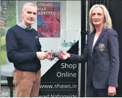  ?? ?? Shaw’s Department Store Fermoy Sponsorshi­p. James Lacey, Manager of Shaw’s Fermoy presenting lady captain Siobhan Feehan with sponsorshi­p for 2022.