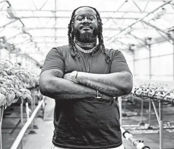  ?? SCOTT GRIES/INVISION ?? Rapper T-Pain, host of “T-Pain’s School of Business,” poses at Gotham Greens in Brooklyn, New York. The program explores niche businesses founded by millennial­s. Many are centered on new technology and forward-thinking concepts.