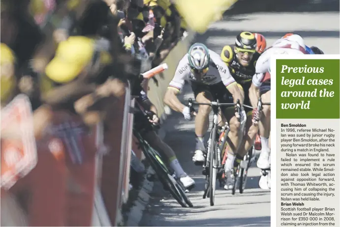  ?? Pictures: Getty Images, AFP ?? THE MOMENT. Mark Cavendish crashed into the barriers with Slovakian Peter Sagan’s elbow clearly visible near the finish line at the end of the fourth stage of the Tour de France in Vittel on Tuesday. Sagan was kicked out of the race, while Cavendish...