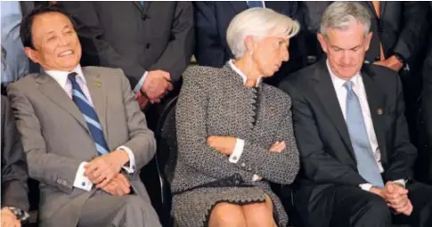  ?? // AFP ?? Christine Lagarde, presidenta del BCE, y a su izquierda, Jerome Powell, presidente de la Fed