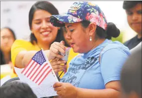  ?? Brian A. Pounds / Hearst Connecticu­t Media ?? Sonia Hernandez, of Make the Road Connecticu­t, speaks at an immigratio­n rally, below, outside the Federal Courthouse in Bridgeport in July. Two asylum seeking children separated from their parents in Texas attended an emergency hearing at the courthouse on Wednesday.