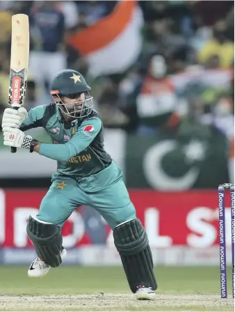  ?? Chris Whiteoak / The National ?? Pakistan’s Shadab Khan at the crease during the match between India and Pakistan in the Asia Cup at Sports City, Dubai – a high-profile encounter won by India