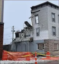  ?? PHOTO COURTESY OF MAYOR HELEN ACKER’S FACEBOOK PAGE ?? A portion of the Madison House that collapsed on Thursday is shown.