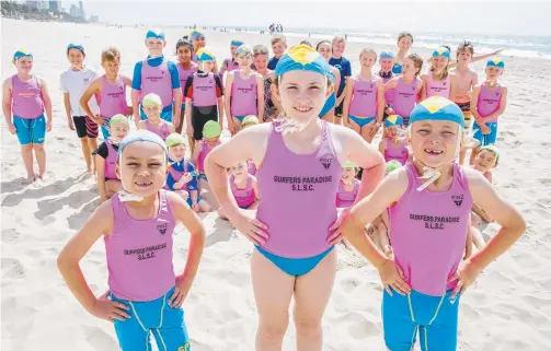  ?? Picture: JERAD WILLIAMS ?? Declan Graham, 7, Seylah James, 9, and Jasper Leslie, 7, were front and centre at Surfers Paradise club’s Nippers sign-on day.