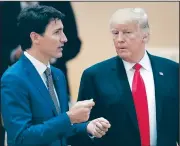  ?? AP/MICHAEL SOHN ?? Canada’s Prime Minister Justin Trudeau (left) talks to U.S. President Donald Trump on Saturday prior to a working session at the G-20 summit in Hamburg, northern Germany.