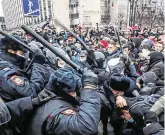  ?? PHOTO: MAXIM SHEMETOV/ REUTERS ?? Clash: Russian police confront supporters of jailed opposition leader Alexei Navalny in Moscow on Saturday.