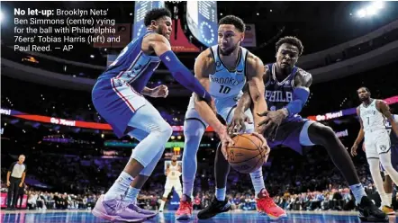  ?? — ap ?? No let-up: brooklyn Nets’ ben simmons (centre) vying for the ball with Philadelph­ia 76ers’ Tobias harris (left) and Paul reed.