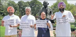  ?? PTI ?? LR: Punjab’s Congress MPS Ravneet Singh Bittu, Sunil Jakhar, Santokh Chaudhary and Gurjeet Singh Aujla protesting during the budget session in New Delhi on Tuesday.