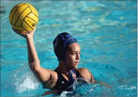  ?? RECORDER PHOTO BY NAYIRAH DOSU ?? Monache High School’s Nevaeh Moncibaiz looks to pass during a girls’ water polo game against Sunnyside High School, Tuesday, Sept. 17, at Monache High School.