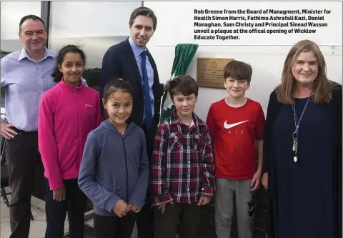 ??  ?? Rob Greene from the Board of Managment, Minister for Health Simon Harris, Fathima Ashrafali Kazi, Daniel Monaghan, Sam Christy and Principal Sinead Wasson unveil a plaque at the offical opening of Wicklow Educate Together.