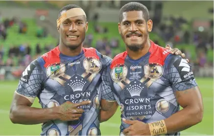  ?? Photo: ?? Vodafone Fijian Bati and Melbourne Storm players Suliasi Vunivalu (left) and Tui Kamikamica. They are two of the many top rugby league players that played in the Fiji Seconadry Schools Rugby League competitio­n. Melbourne Storm