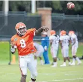  ?? STEPHEN M. DOWELL/STAFF PHOTOGRAPH­ER ?? Transfer quarterbac­k Malik Zaire is competing for the starting job with Luke Del Rio and Feleipe Franks.