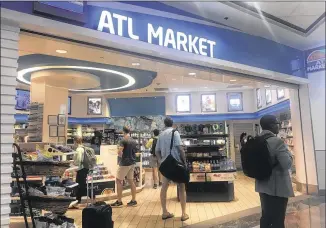  ??  ?? City officials aim to choose winners for contracts for shops at Hartsfield-Jackson Internatio­nal and finalize contracts before end of the year — and before Atlanta Mayor Kasim Reed’s term ends in January.