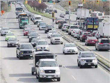  ?? DARREN STONE, TIMES COLONIST ?? Rush-hour traffic leaving Victoria on the Trans-Canada Highway. Trevor Hancock suggests that telecommut­ing could be one way to ease the Colwood Crawl.