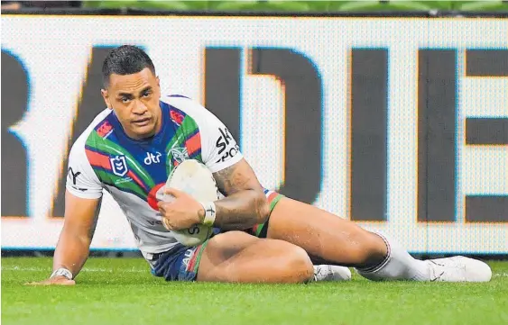  ?? Photo / Photosport ?? Ken Maumalo scored a hat-trick of tries for the Warriors in Melbourne last night.