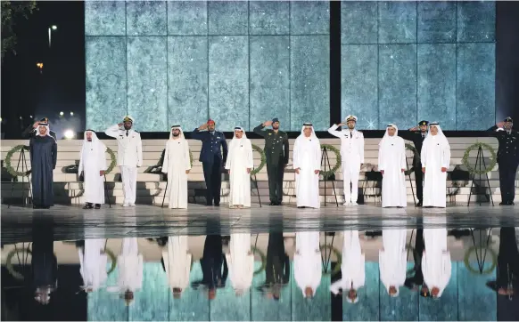  ?? Ryan Carter / Ministry of Presidenti­al Affairs ?? The Rulers and leaders of the seven emirates of the UAE pay tribute at Wahat Al Karama in Abu Dhabi yesterday