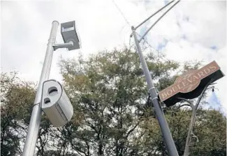  ?? ERIN HOOLEY/CHICAGO TRIBUNE ?? A speed camera on East Morgan Drive in Chicago’s Washington Park issued the most citations in the city in the first two months after Mayor Lori Lightfoot lowered the minimum speed for getting a ticket to 6 mph over the limit.