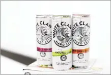  ??  ?? Mike’s Hard Lemonade took a pass on hard sodas, but this year it’s ramping up marketing and distributi­on for its new White Claw Hard Seltzer. It will have heavy competitio­n in a growing beverage market.