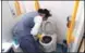  ?? YU FANGPING / FOR CHINA DAILY ?? A staff member cleans a toilet on a train last month.
