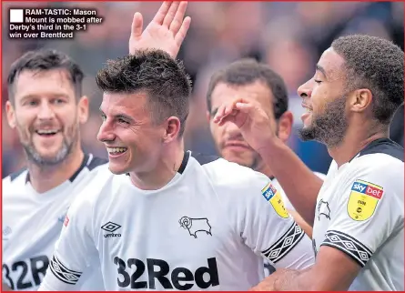  ??  ?? RAM-TASTIC: Mason Mount is mobbed after Derby’s third in the 3-1 win over Brentford
