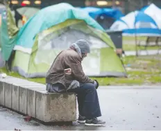  ?? JASON PAYNE ?? The Pivot Legal Society says tents of some park residents were damaged when police responded to the area after a report of a shooting. Pivot says homicide is not the biggest threat to residents in the park.