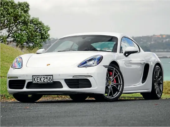  ??  ?? Compact size, mid-mounted turbo-four engine and lots of 911 bits to make it go faster: meet the 718 Cayman S.